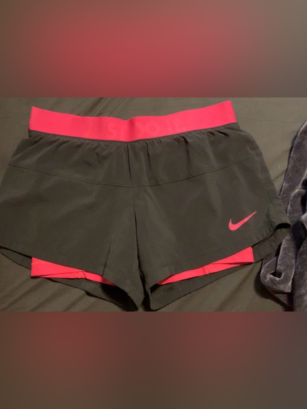 Nike Women’s Black Athletic Shorts with Pink Waistband and Trim